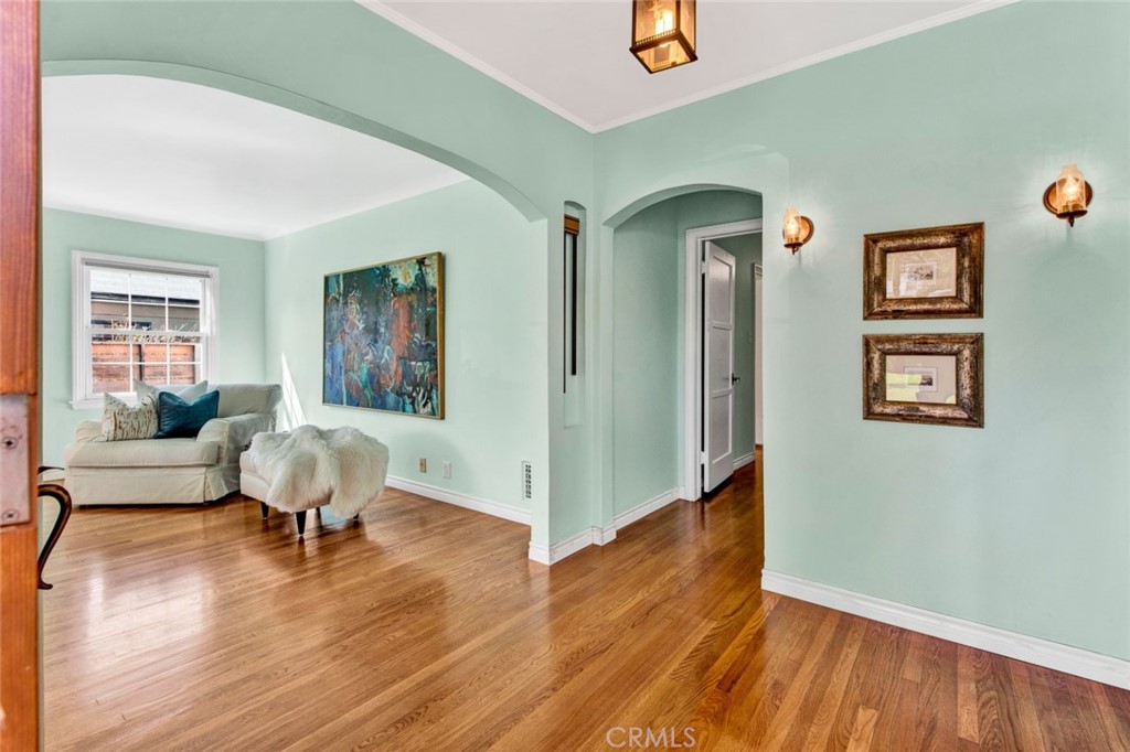 1722 North Flower Street Santa Ana, CA 92706 - Photo 3 of 25 a view of a livingroom with furniture and hardwood floor