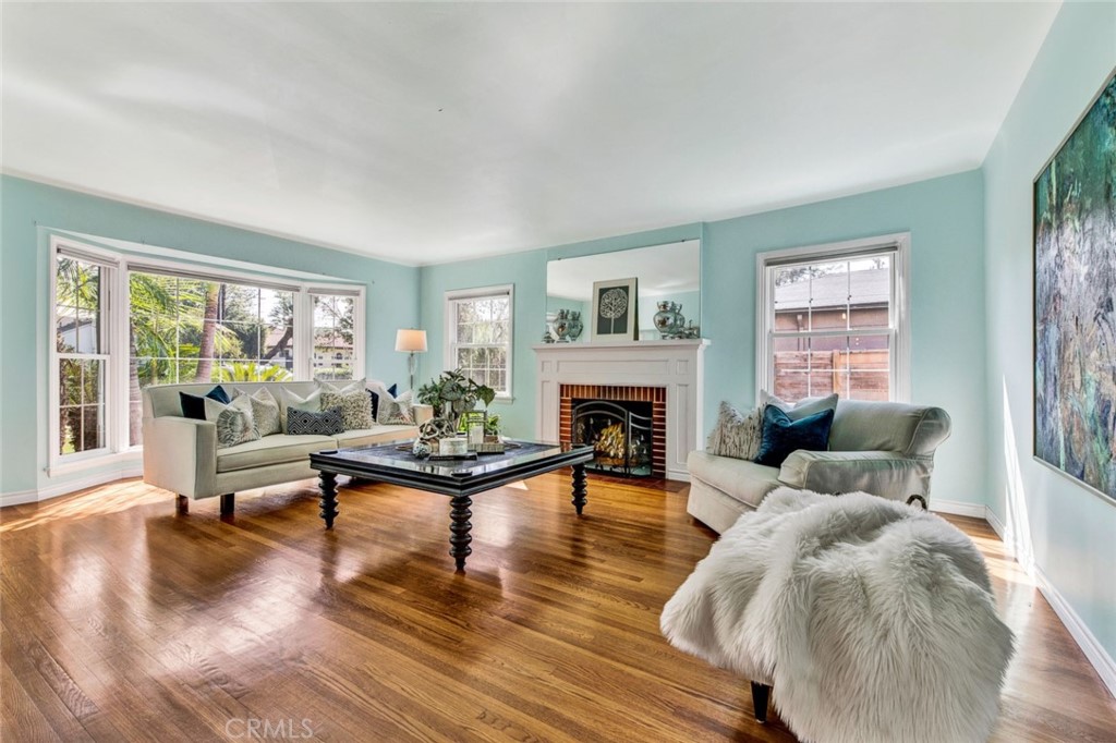 1722 North Flower Street Santa Ana, CA 92706 - Photo 5 of 25 a living room with furniture and a fireplace