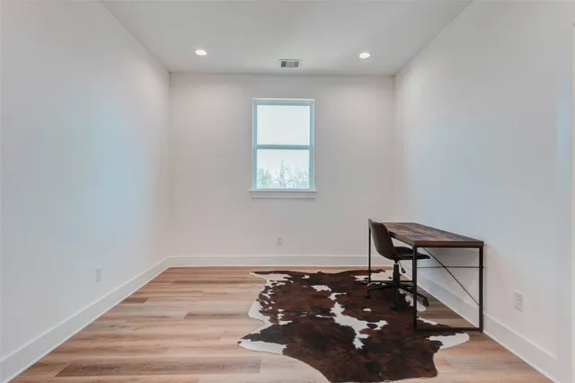 a room with toys and wooden floor