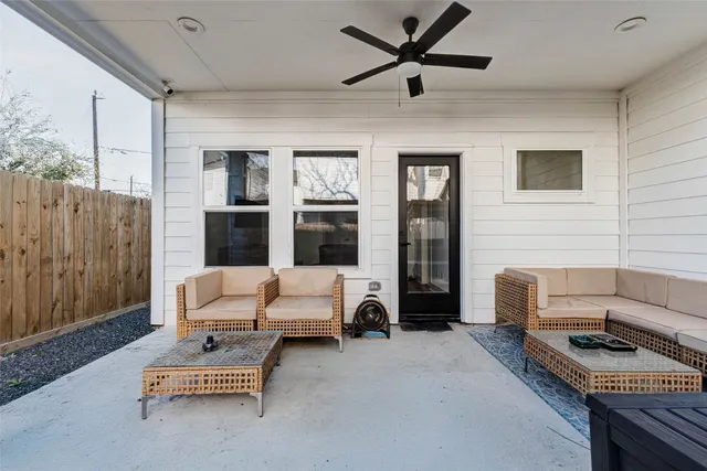a living room with furniture and a window