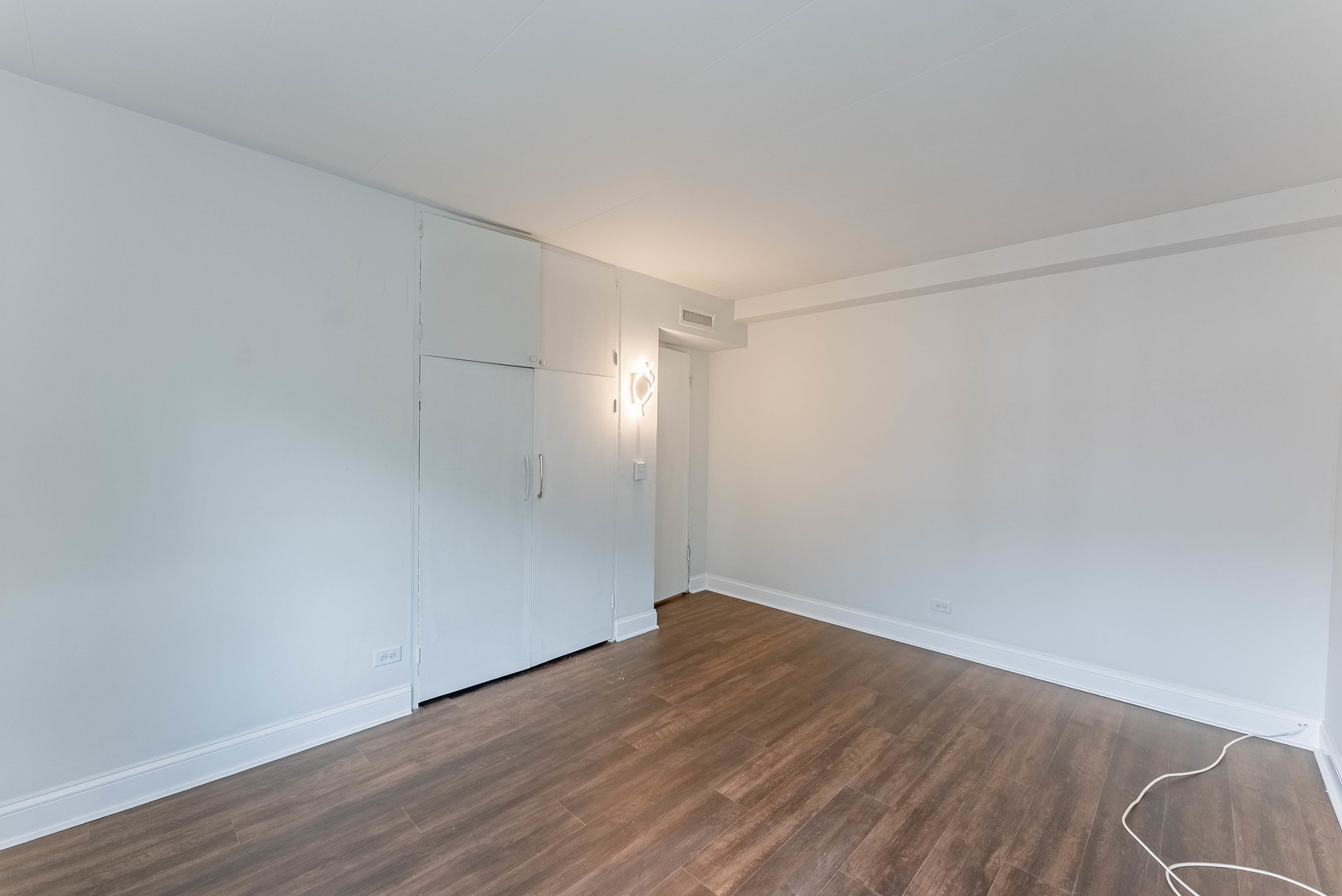 7200 Oak Avenue, Unit 3NW River Forest, IL 60305 - Photo 3 of 9 a view of an empty room with wooden floor