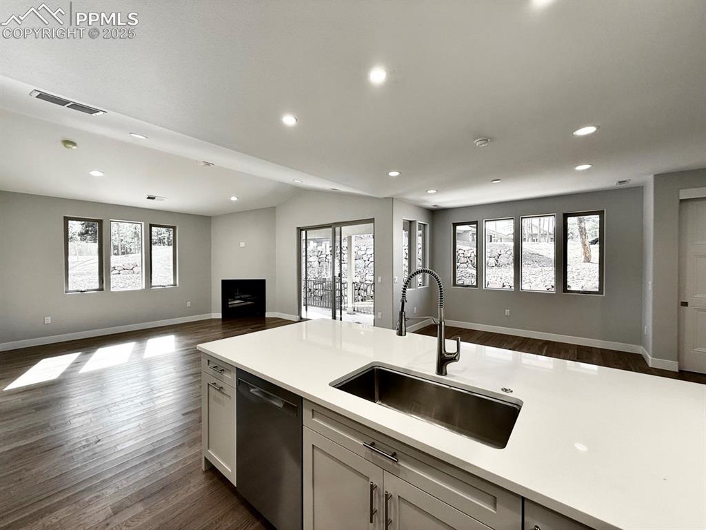 3155 Promise Point Colorado Springs, CO 80921 - Photo 12 of 26 a kitchen with a sink and large window