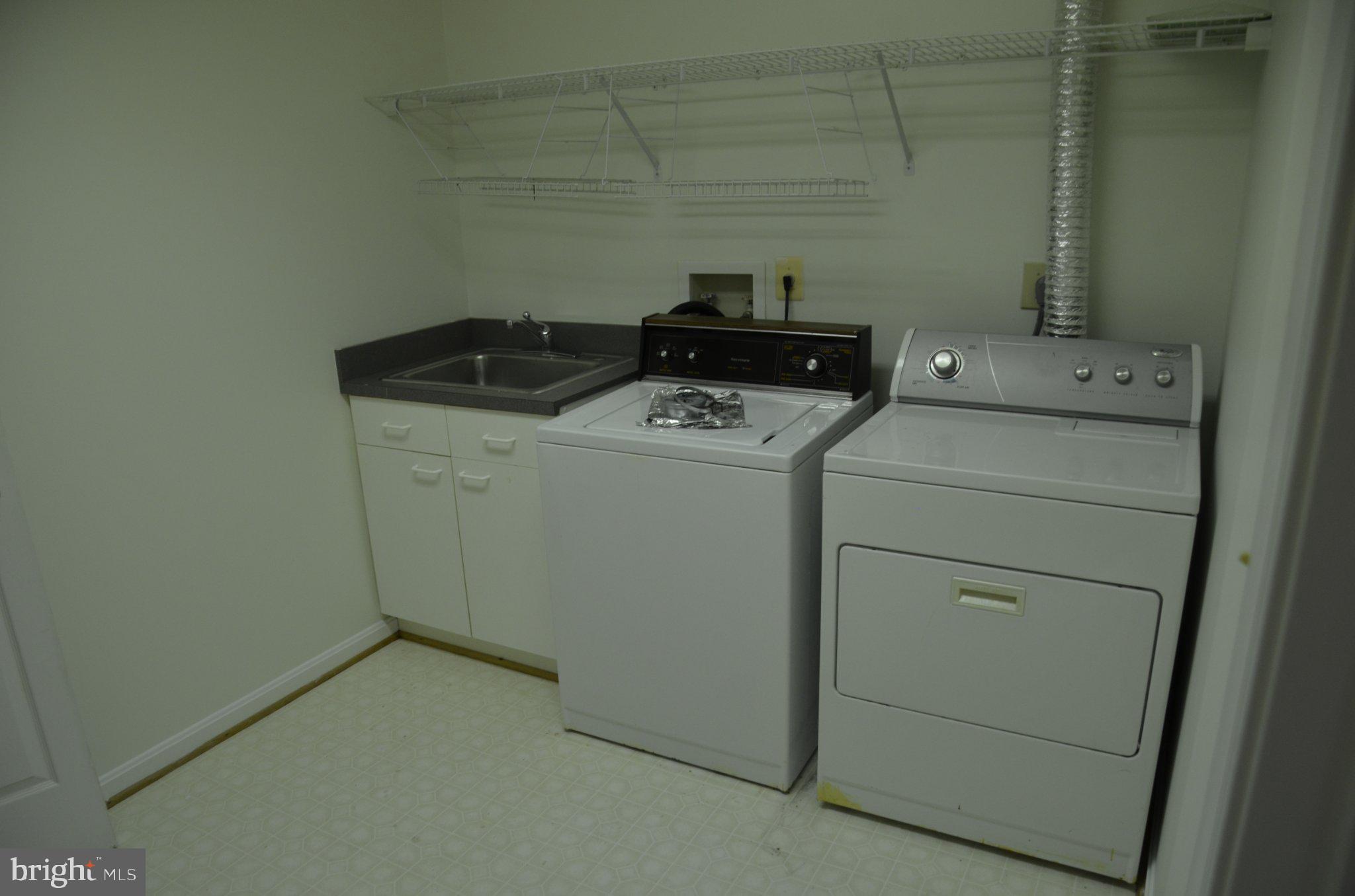 406 Longdraft Road Gaithersburg, MD 20878 - Photo 20 of 24 Functional laundry space with essentials.