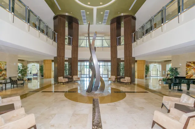 a room with lots of table and chairs