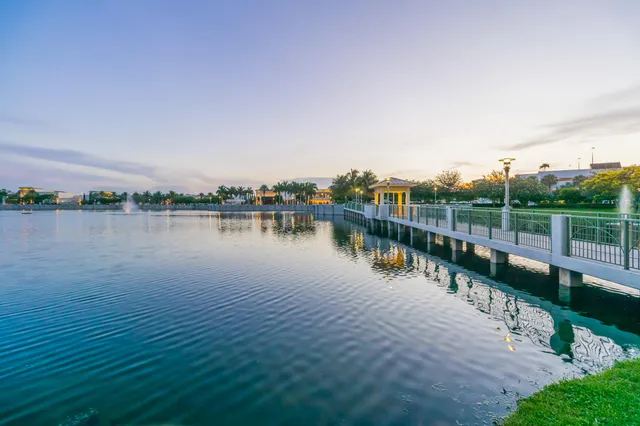 a view of a lake with houses in background