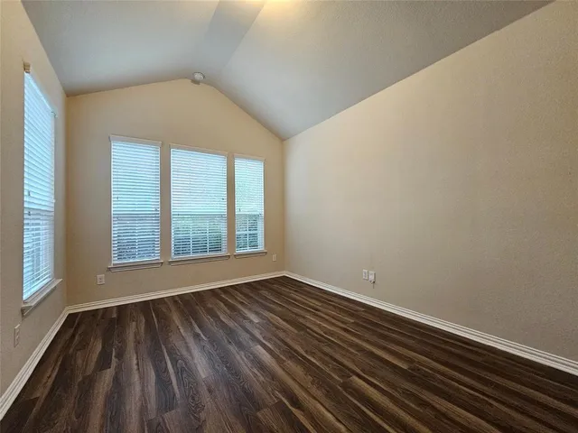 a kitchen with kitchen island a counter top space and a large window
