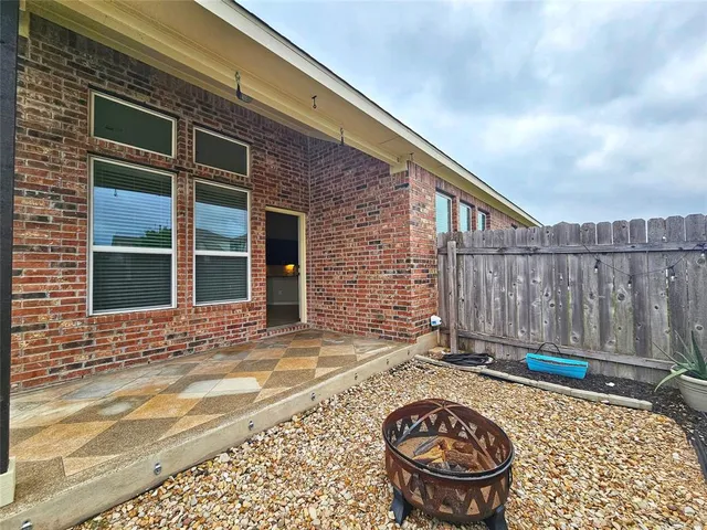 an empty room with a empty space and wooden floor