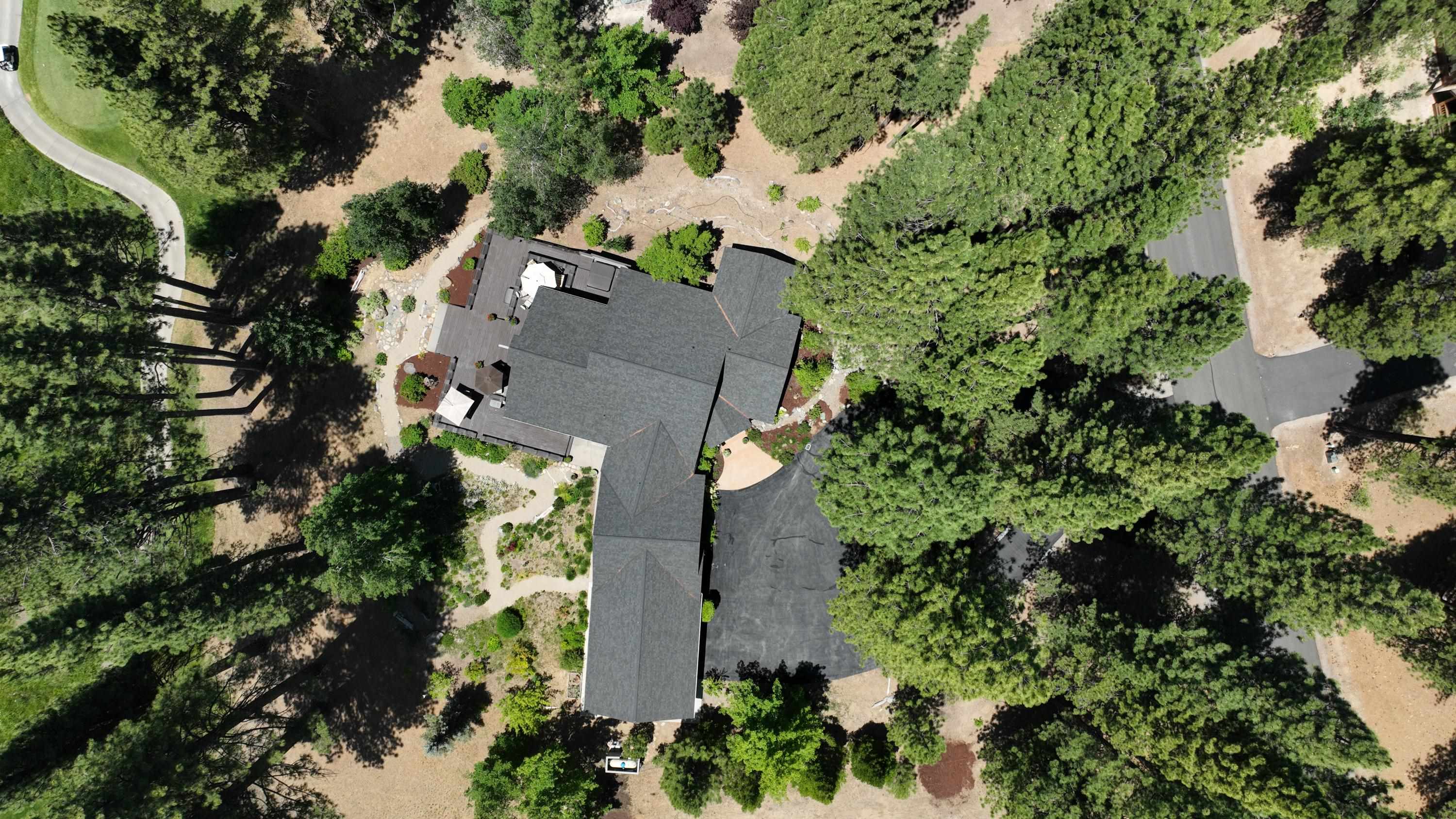 134 Quail View Circle Clio, CA 96106 - Photo 39 of 49 an aerial view of a house with a yard and garden