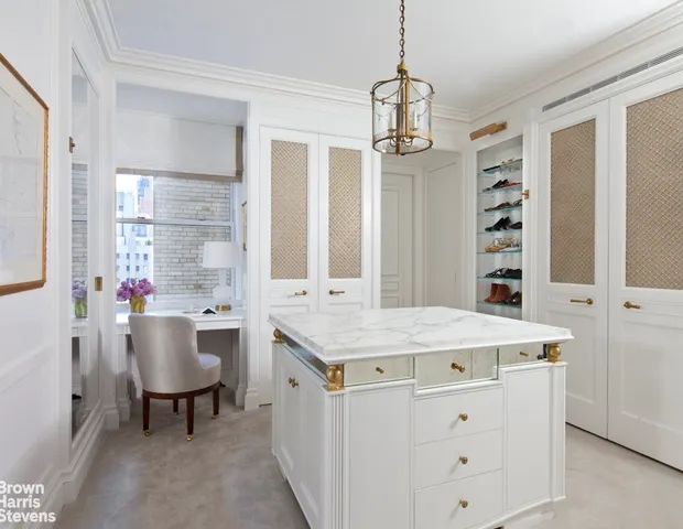 a kitchen that has a table and chairs in it
