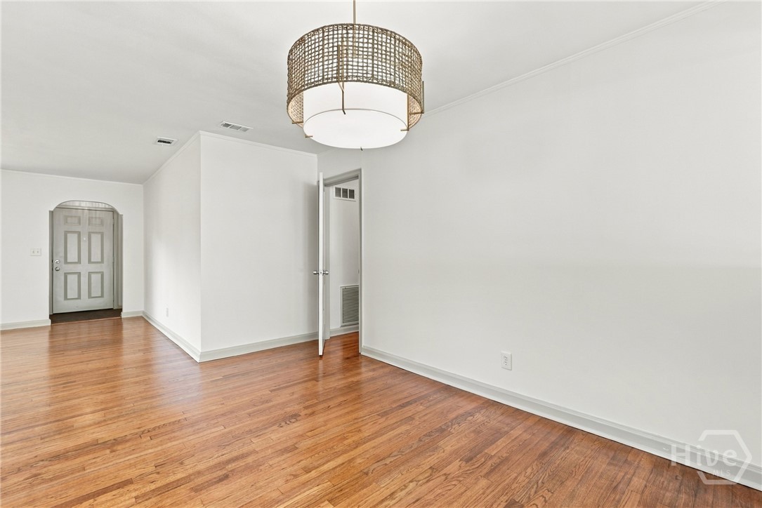 209 Brandywine Road Savannah, GA 31405 - Photo 13 of 45 DINING ROOM W/CHANDELIER