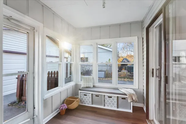 a view of living room with furniture and large window