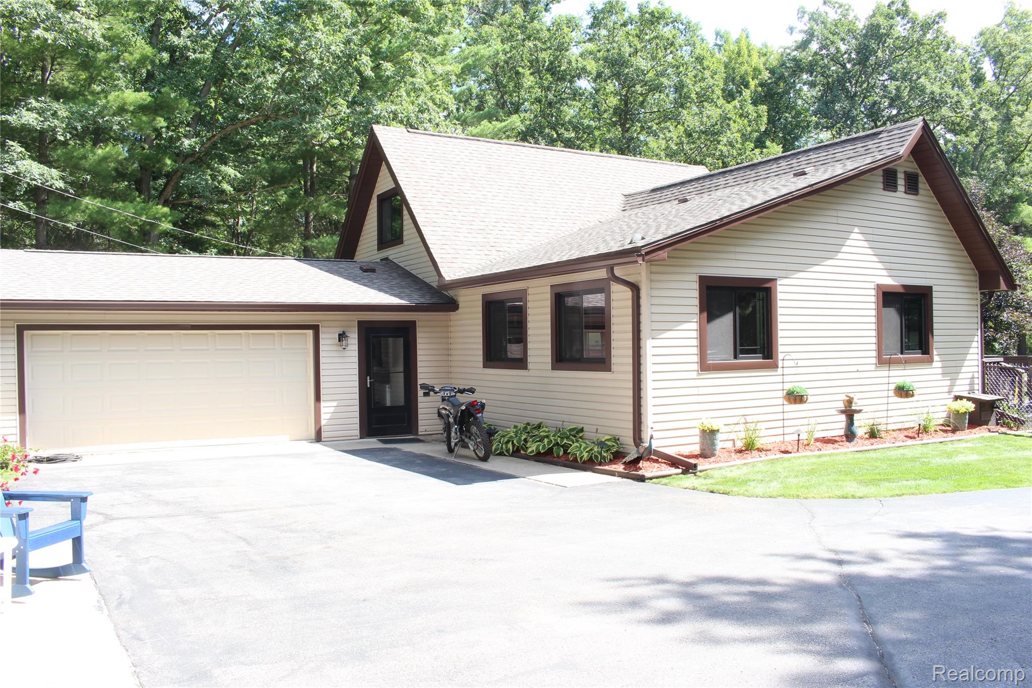 5799 Goodar Road South Branch, MI 48761 - Photo 9 of 58 Maintenance-free Vinyl sided home with all new aluminum trim and all new Anderson High-Quality windows