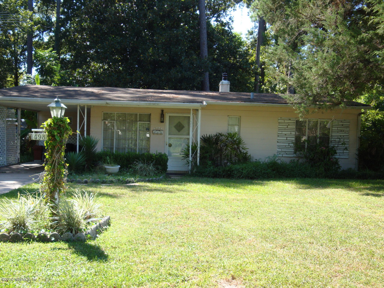 1498 Stimson Street Jacksonville, FL 32205 - Photo 1 of 6 a view of a swimming pool with a patio