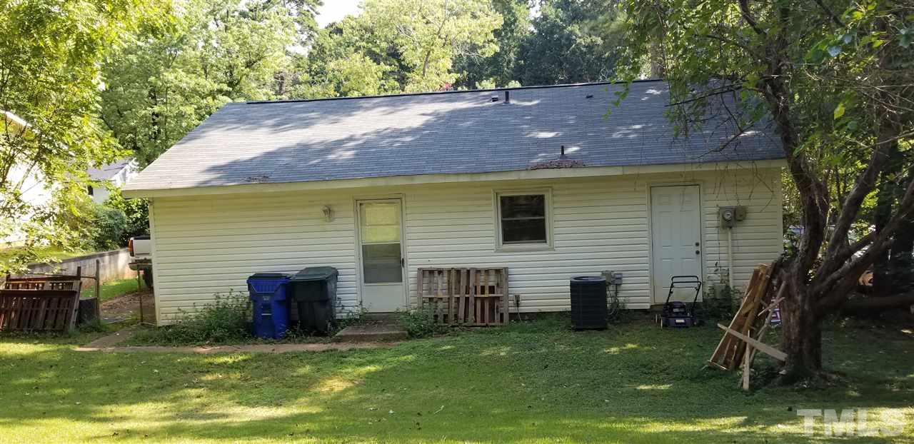 7512 Stuart Drive Raleigh, NC 27615 - Photo 2 of 9 a view of a house with a yard