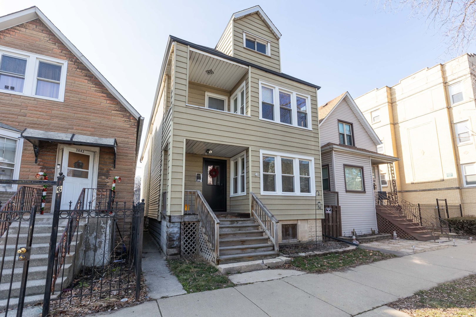 a front view of a house with a porch