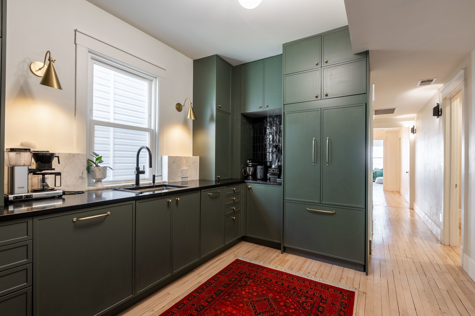 Undisclosed Address Chicago, IL 60647 - Photo 12 of 42 a kitchen with stainless steel appliances granite countertop a refrigerator and a sink