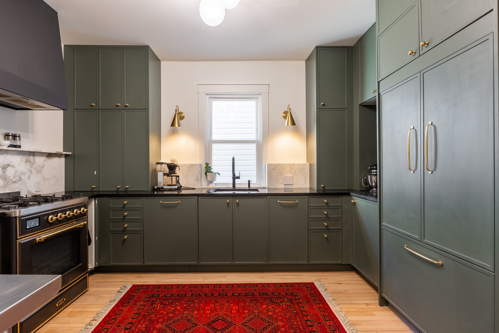Undisclosed Address Chicago, IL 60647 - Photo 13 of 42 a kitchen with granite countertop a refrigerator and a sink