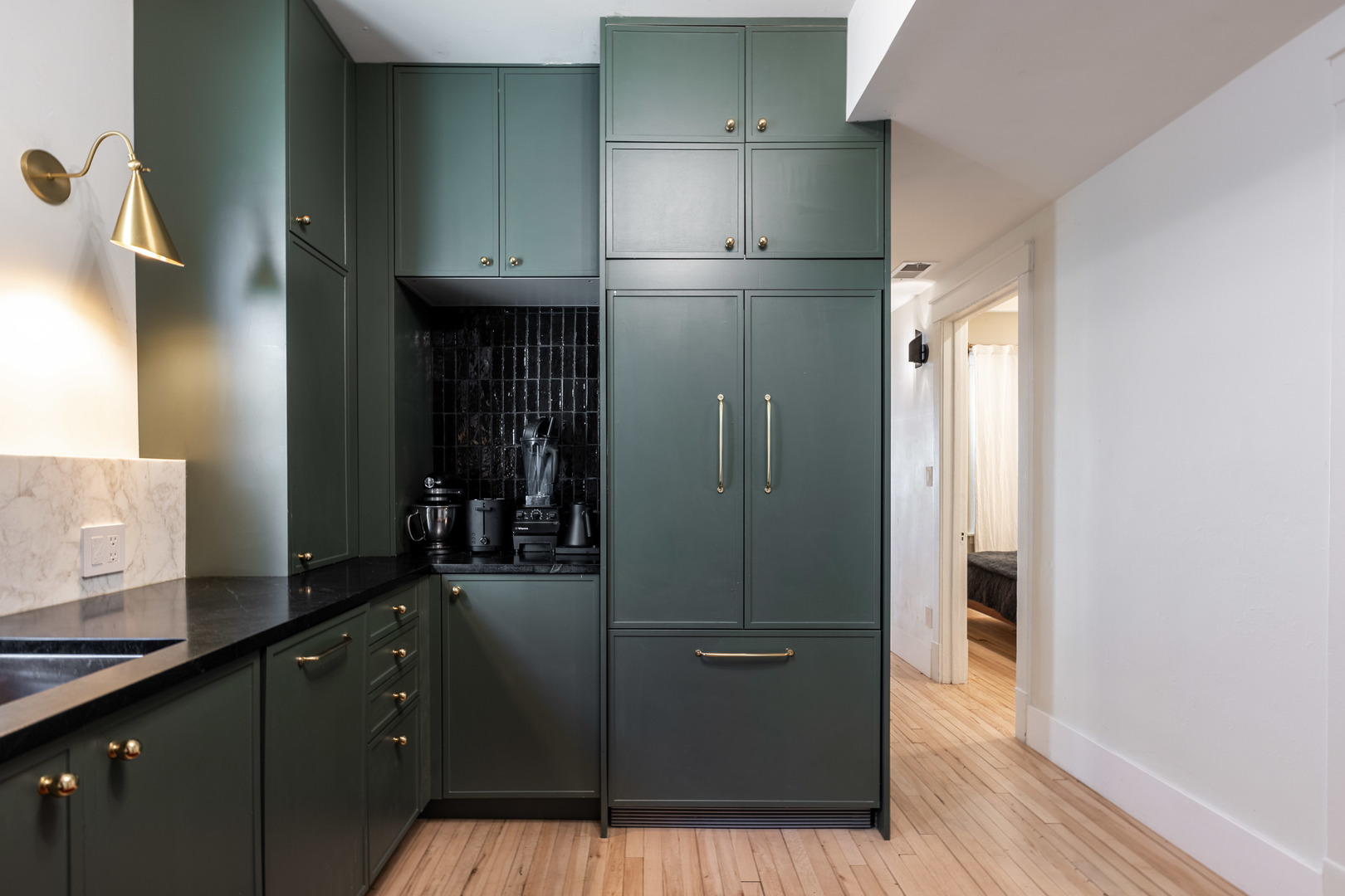 Undisclosed Address Chicago, IL 60647 - Photo 14 of 42 a kitchen with stainless steel appliances granite countertop a refrigerator and a sink