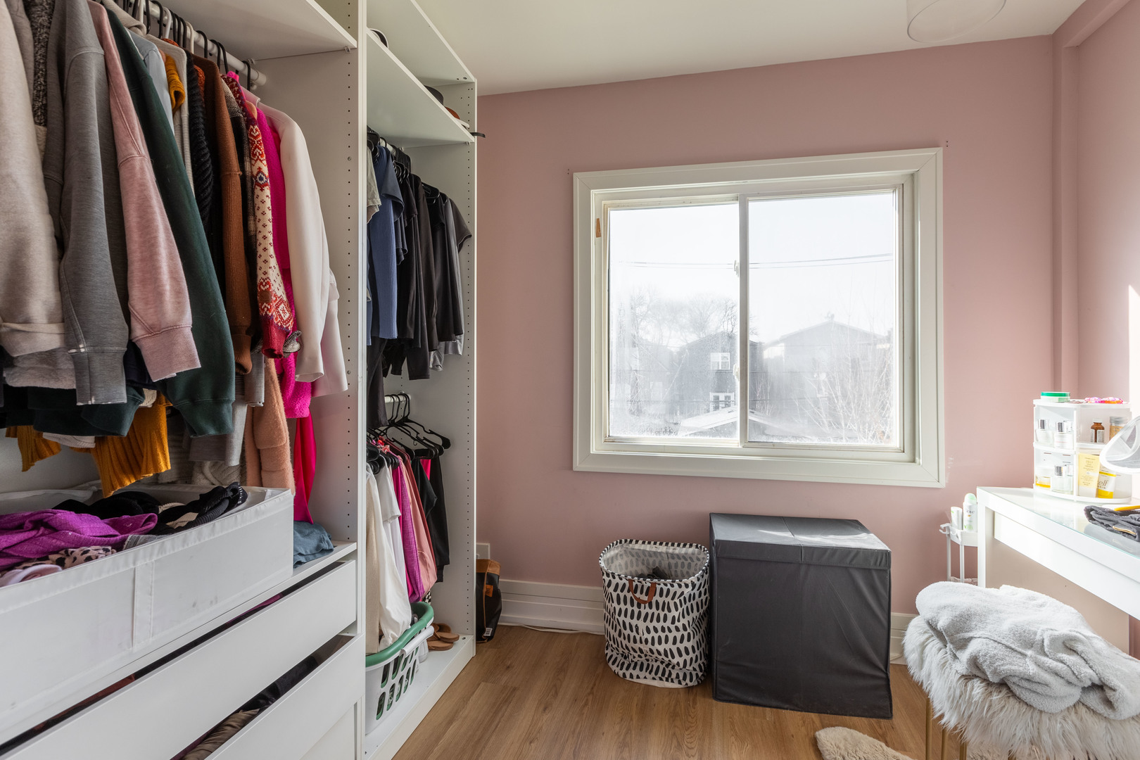 Undisclosed Address Chicago, IL 60647 - Photo 24 of 42 a view of walk in closet with clothes and shoes