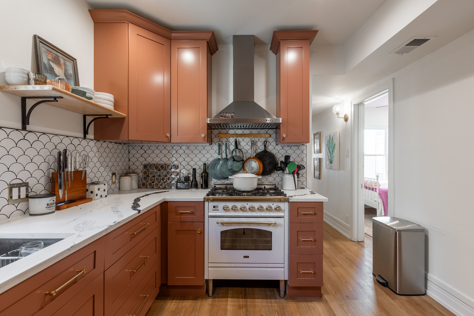 Undisclosed Address Chicago, IL 60647 - Photo 28 of 42 a kitchen with cabinets and a stove