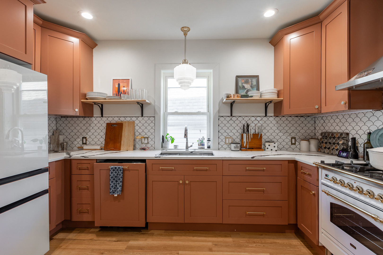 Undisclosed Address Chicago, IL 60647 - Photo 30 of 42 a kitchen with a sink and cabinets