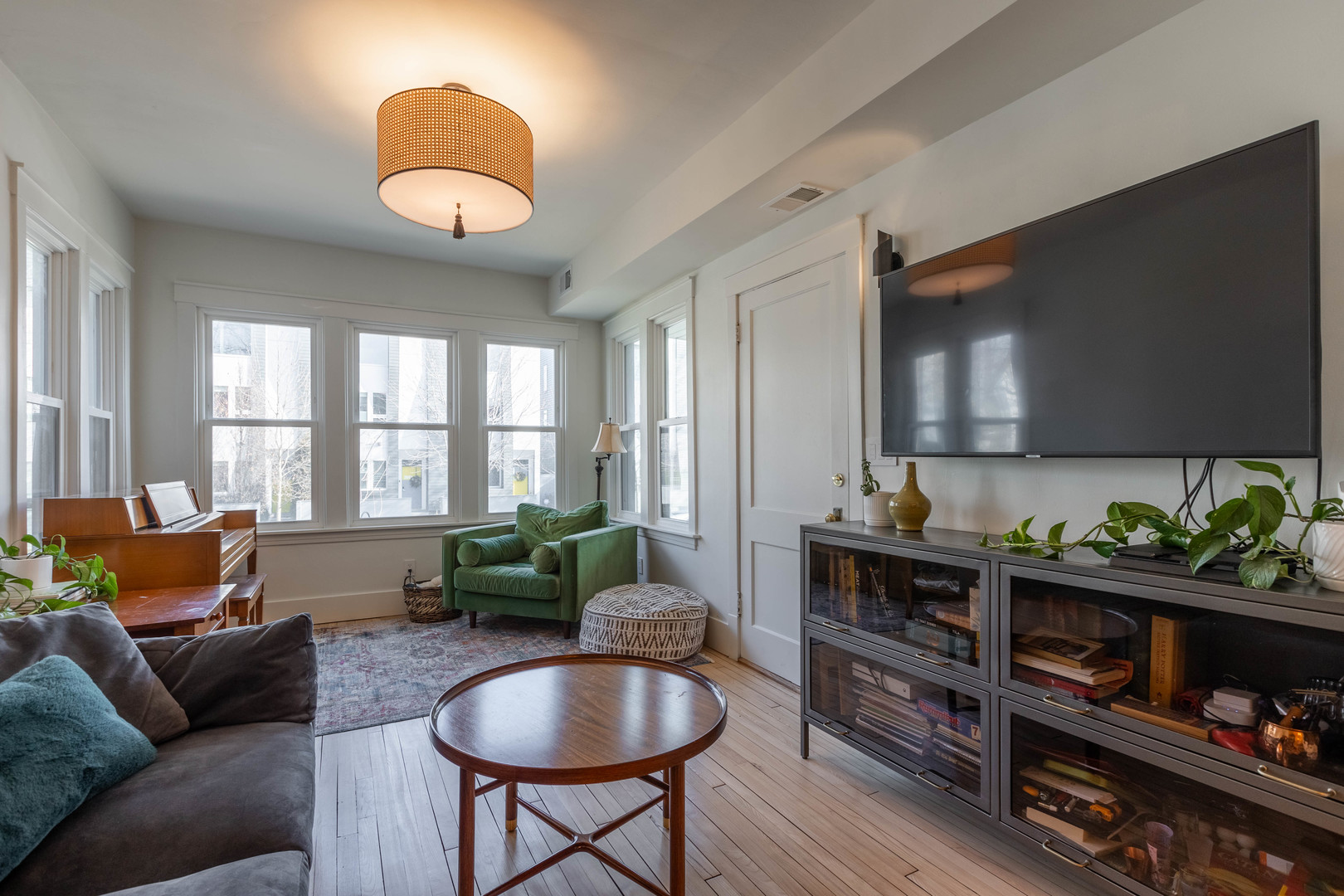 Undisclosed Address Chicago, IL 60647 - Photo 3 of 42 a living room with furniture and a potted plant