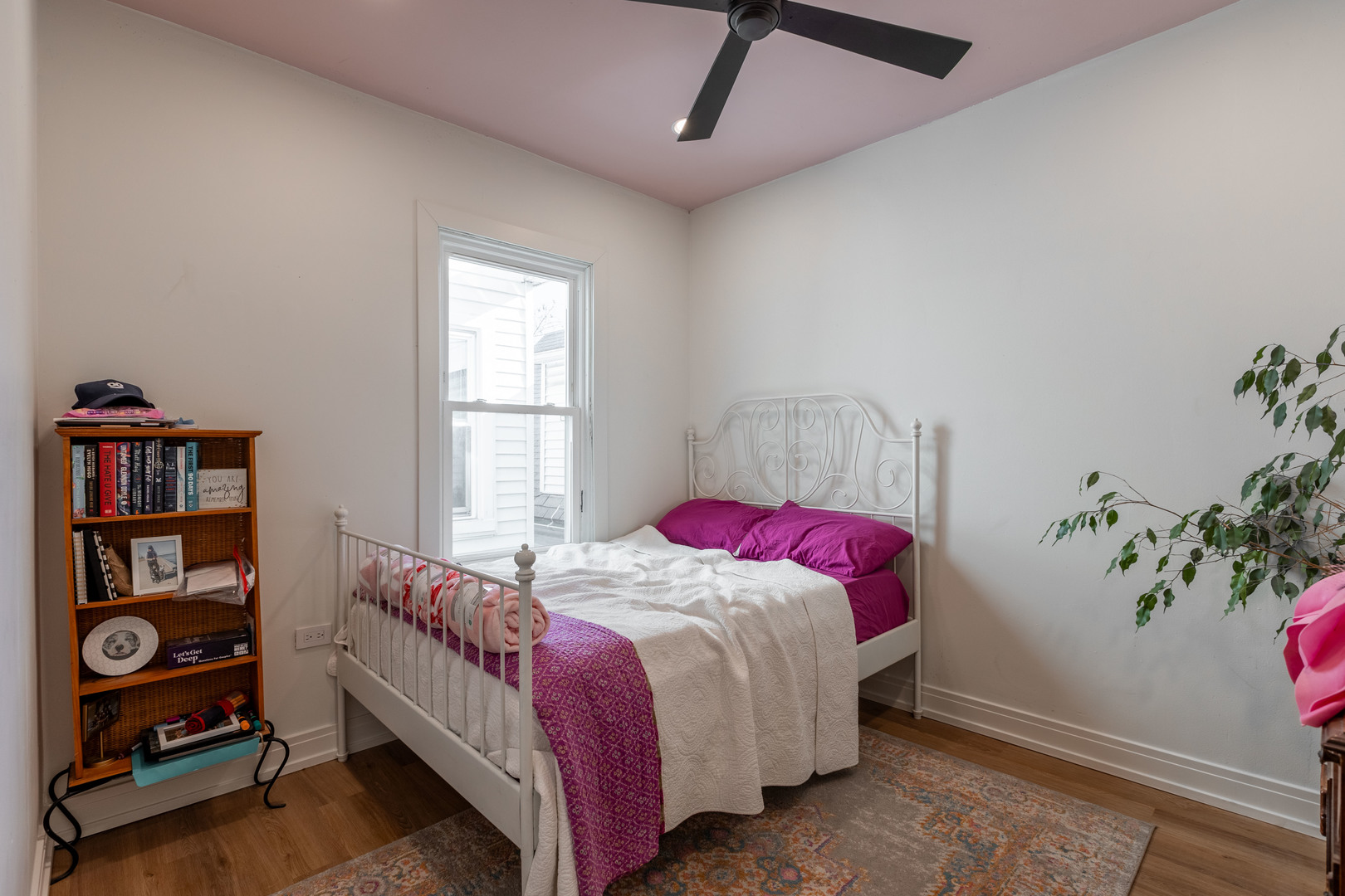 Undisclosed Address Chicago, IL 60647 - Photo 32 of 42 a bedroom with a bed and a window