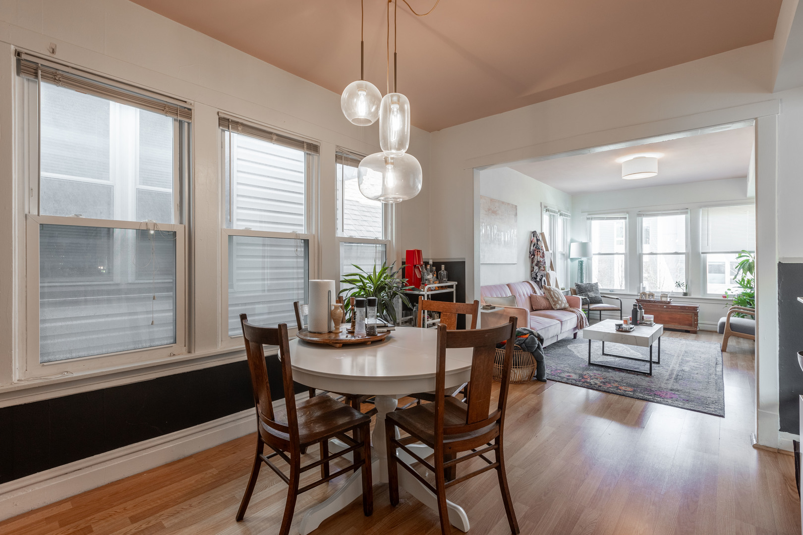 Undisclosed Address Chicago, IL 60647 - Photo 34 of 42 a view of a dining room with furniture window and wooden floor