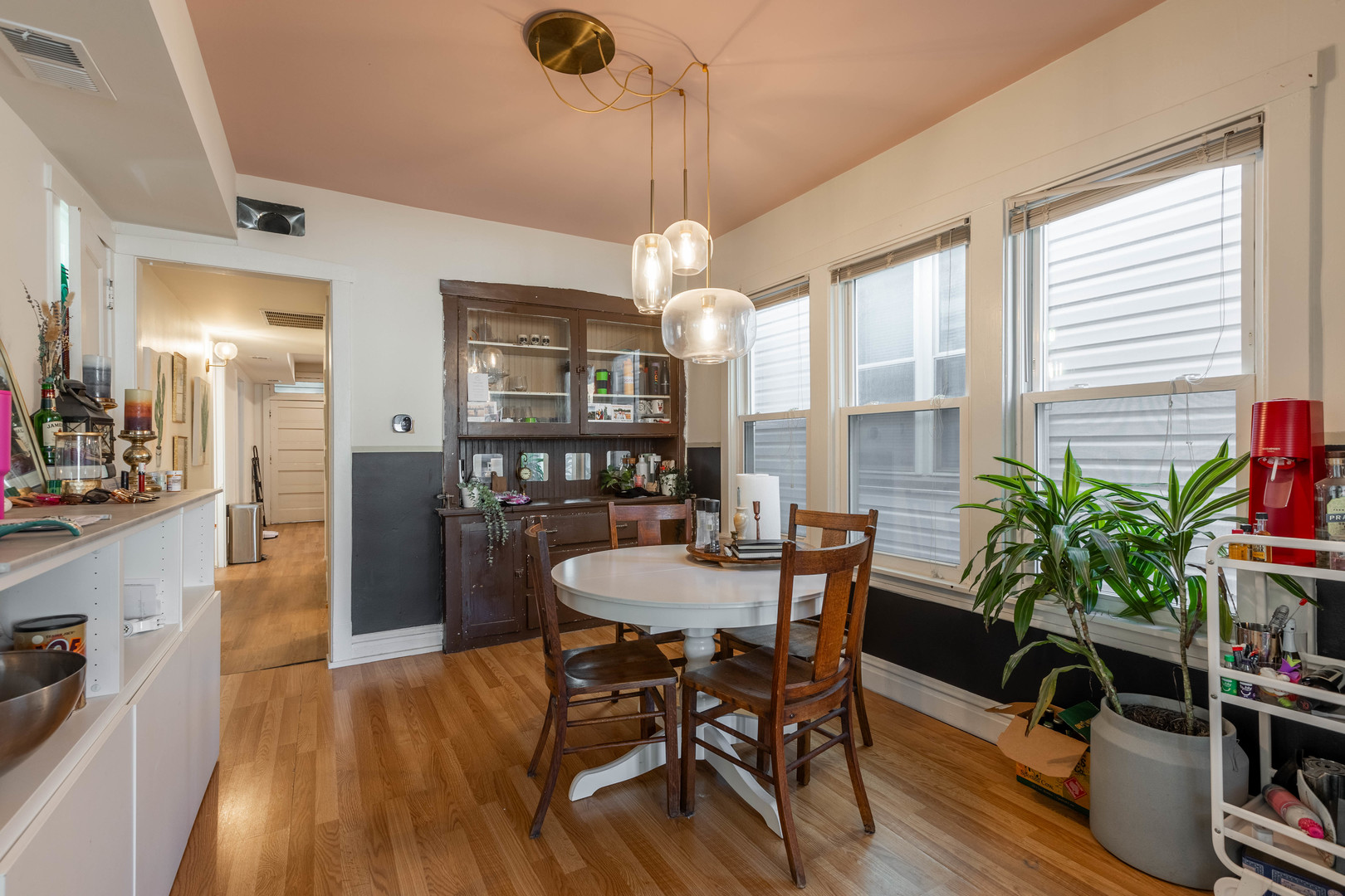 Undisclosed Address Chicago, IL 60647 - Photo 36 of 42 a view of a dining room with furniture window and wooden floor