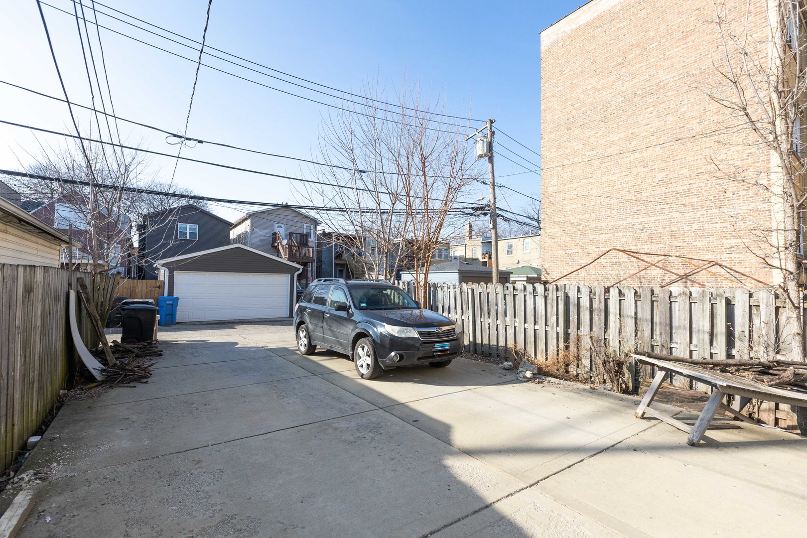 Undisclosed Address Chicago, IL 60647 - Photo 41 of 42 a view of a car park in front of house