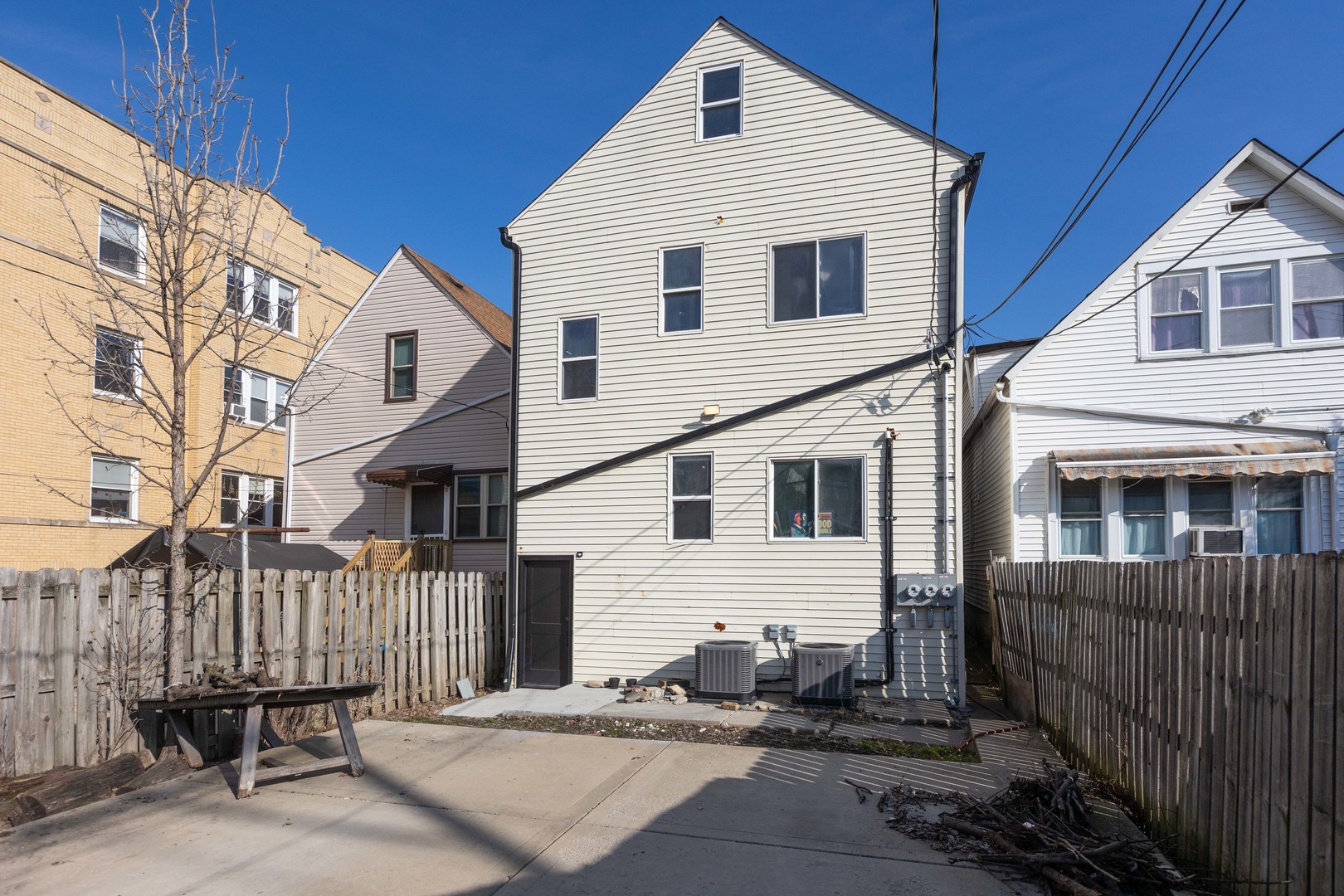 Undisclosed Address Chicago, IL 60647 - Photo 42 of 42 a view of a house with wooden fence
