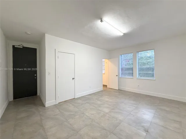 a tall building sitting on the side of a street