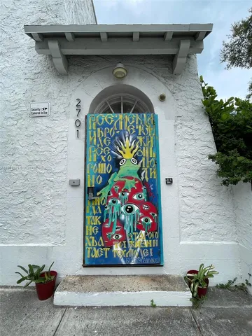 a front view of a house with a garage