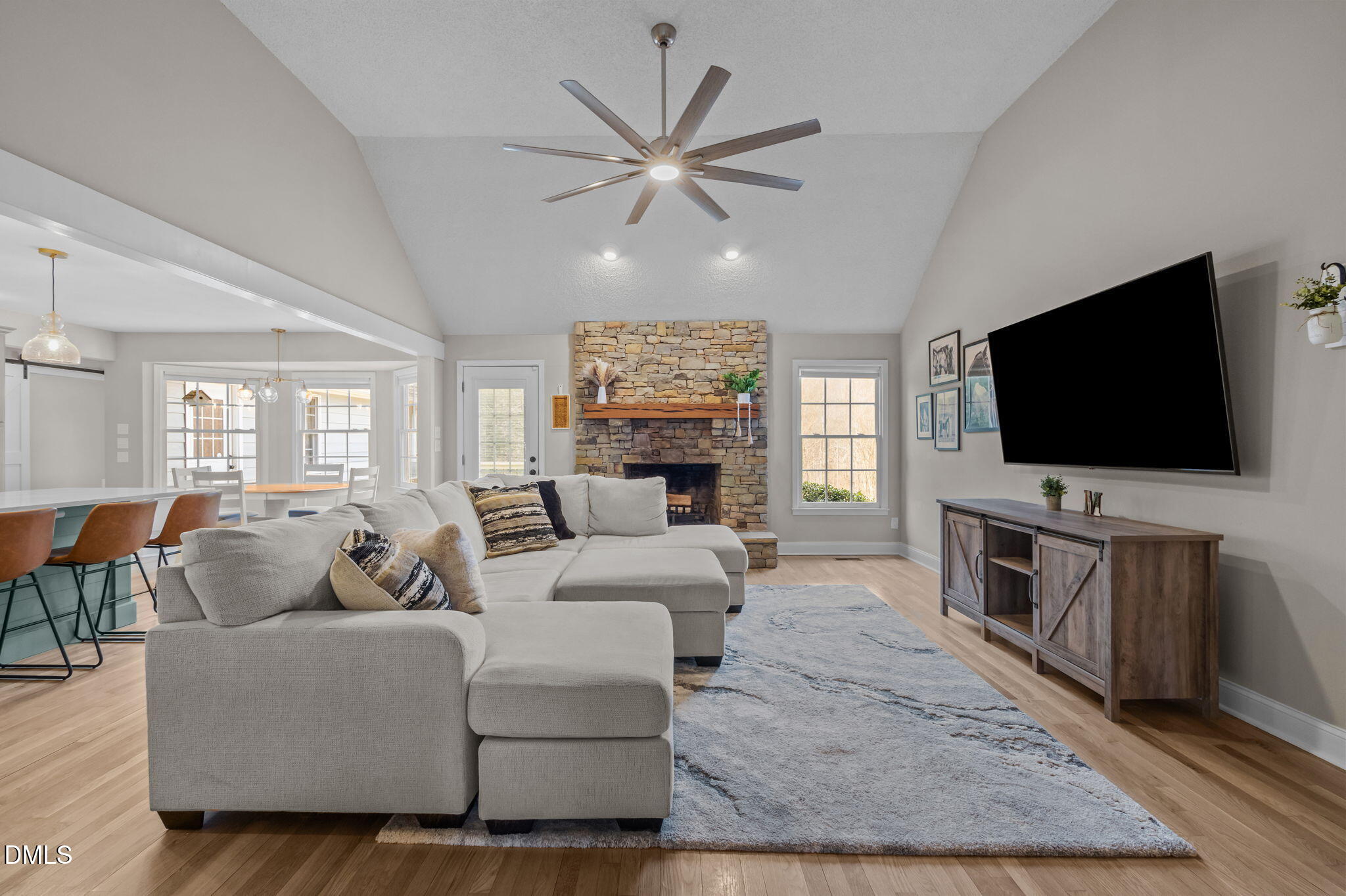 2008 Red Mountain Road Rougemont, NC 27572 - Photo 2 of 31 a living room with furniture and a flat screen tv