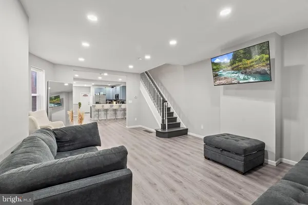 a living room with furniture and a couch