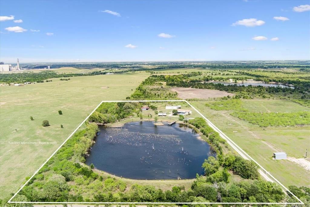 Aerial view with a rural view and a water view