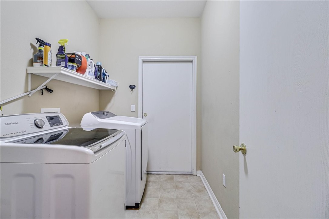 5801 Corsica Road Corpus Christi, TX 78414 - Photo 20 of 39 a utility room with a sink dryer and washer