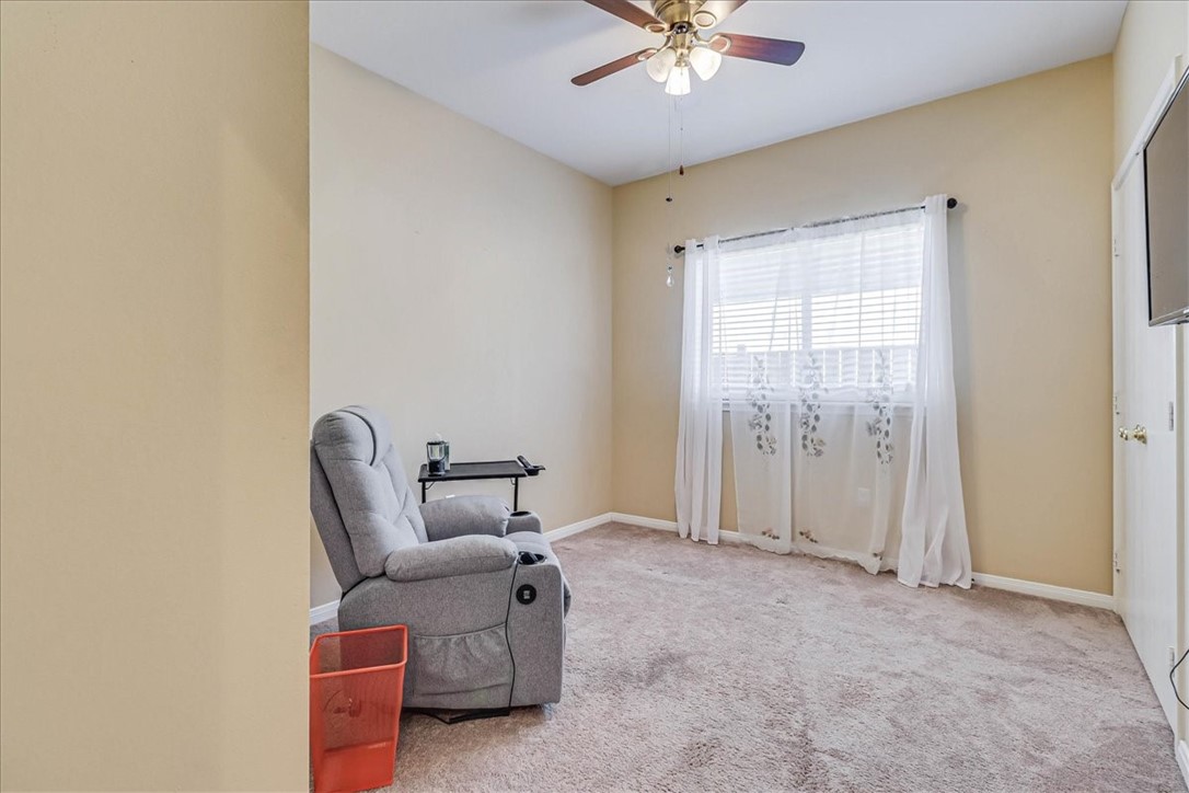 5801 Corsica Road Corpus Christi, TX 78414 - Photo 26 of 39 a living room with furniture and a ceiling fan