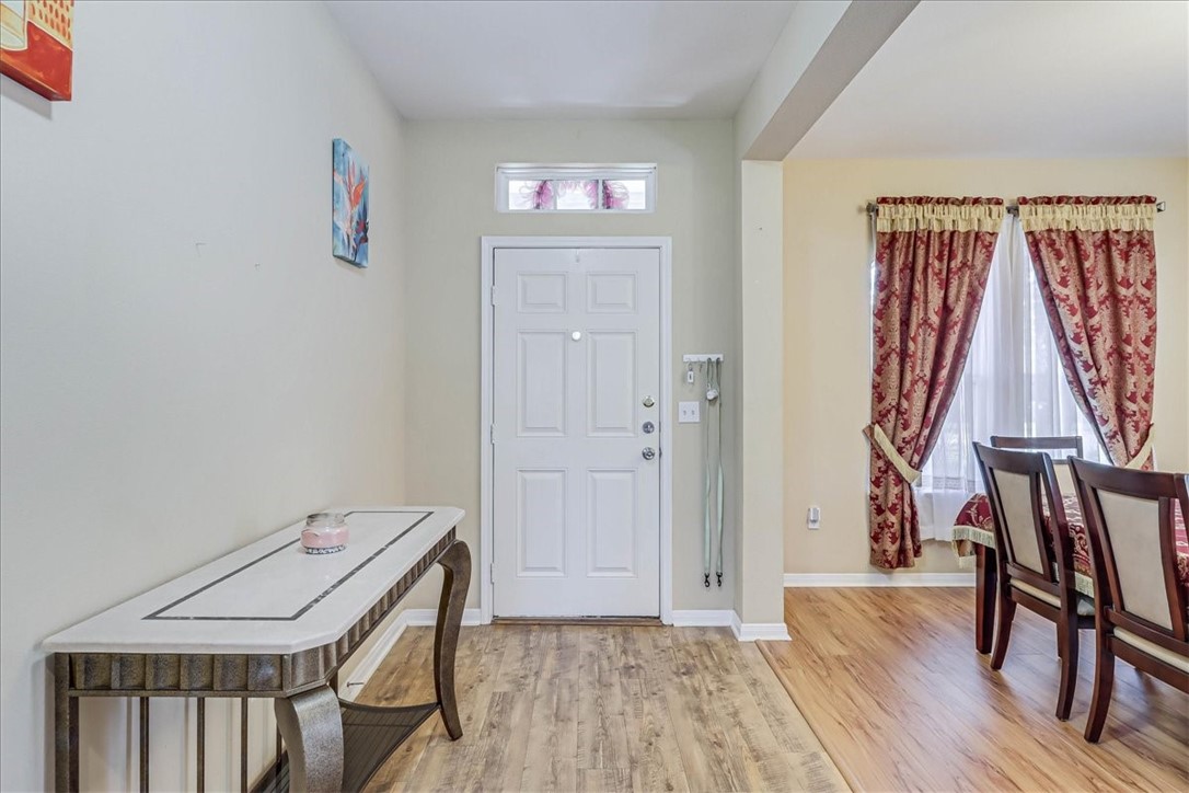5801 Corsica Road Corpus Christi, TX 78414 - Photo 3 of 39 a view of a room with furniture and wooden floor