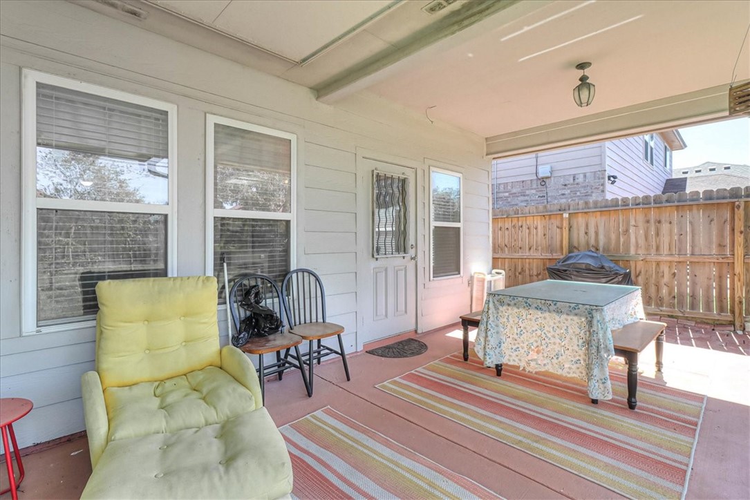 5801 Corsica Road Corpus Christi, TX 78414 - Photo 33 of 39 a living room with patio furniture and a wooden floor