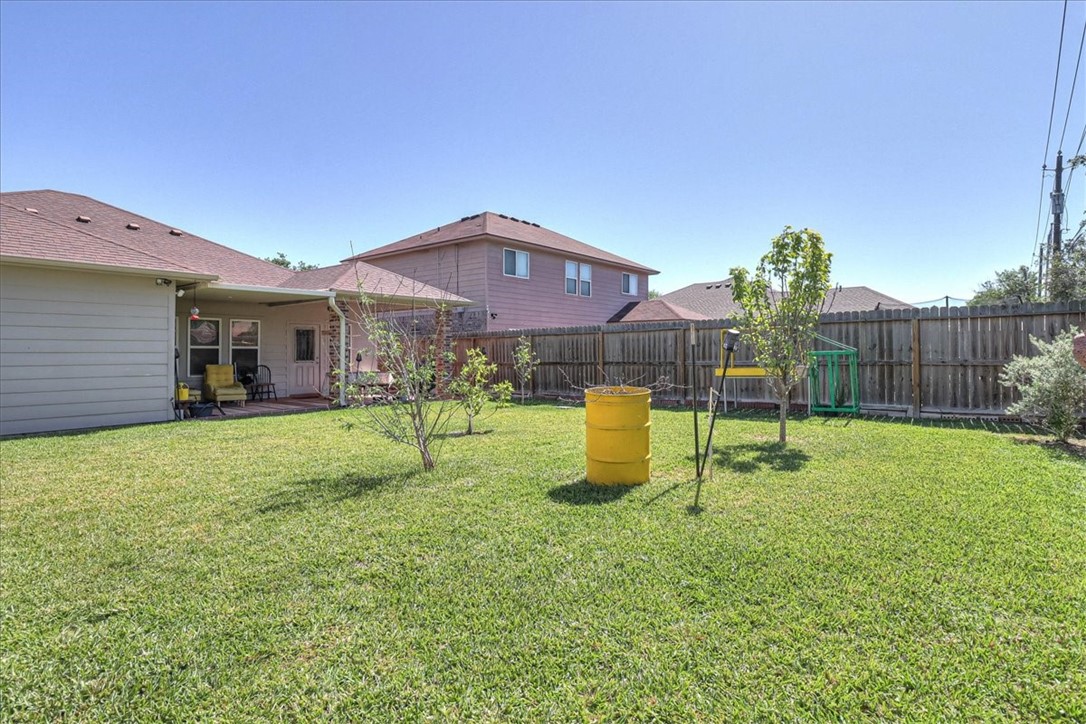 5801 Corsica Road Corpus Christi, TX 78414 - Photo 36 of 39 a view of a house with a backyard