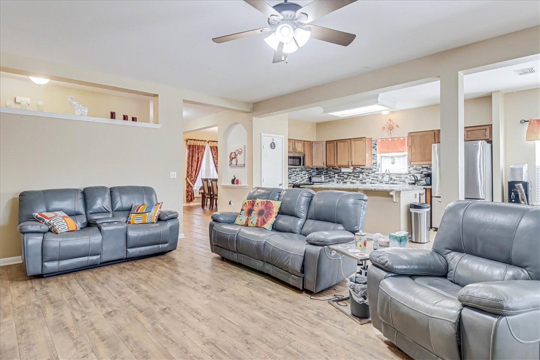 5801 Corsica Road Corpus Christi, TX 78414 - Photo 7 of 39 a living room with furniture and a view of kitchen