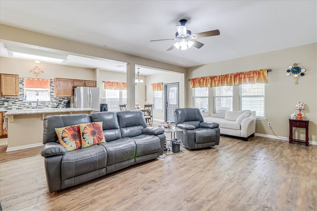 5801 Corsica Road Corpus Christi, TX 78414 - Photo 9 of 39 a living room with furniture and a large window