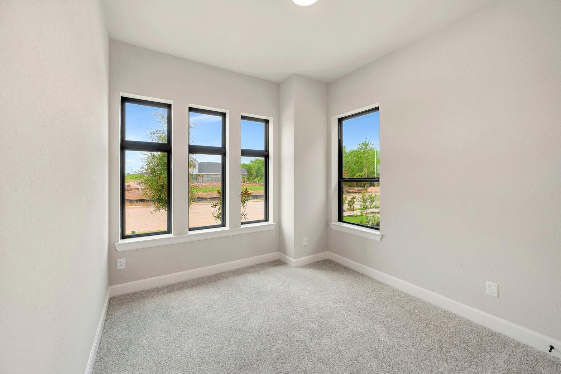 2722 Cottage Place Rosharon, TX 77583 - Photo 18 of 50 a view of an empty room with a window