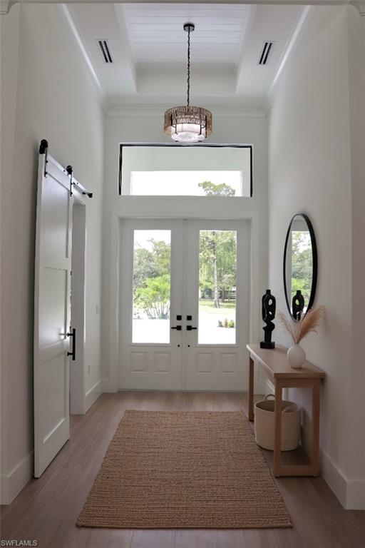 428 21st Street Southwest Naples, FL 34117 - Photo 13 of 45 a living room with furniture and a window