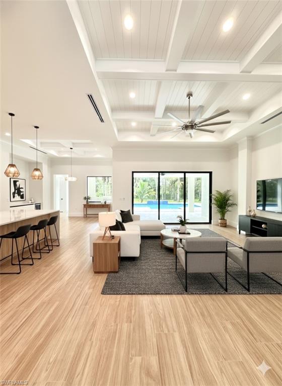 428 21st Street Southwest Naples, FL 34117 - Photo 14 of 45 a living room with furniture and a large window