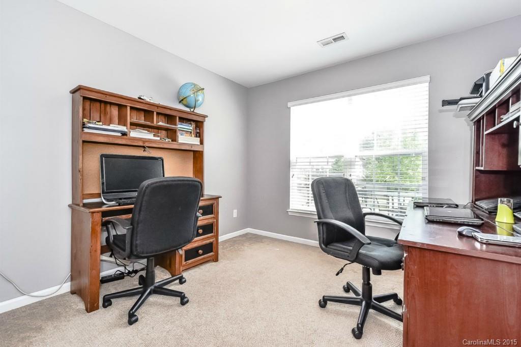 7475 Fallen Timber Lane Tega Cay, SC 29708 - Photo 14 of 24 a view of a workspace with furniture and a window