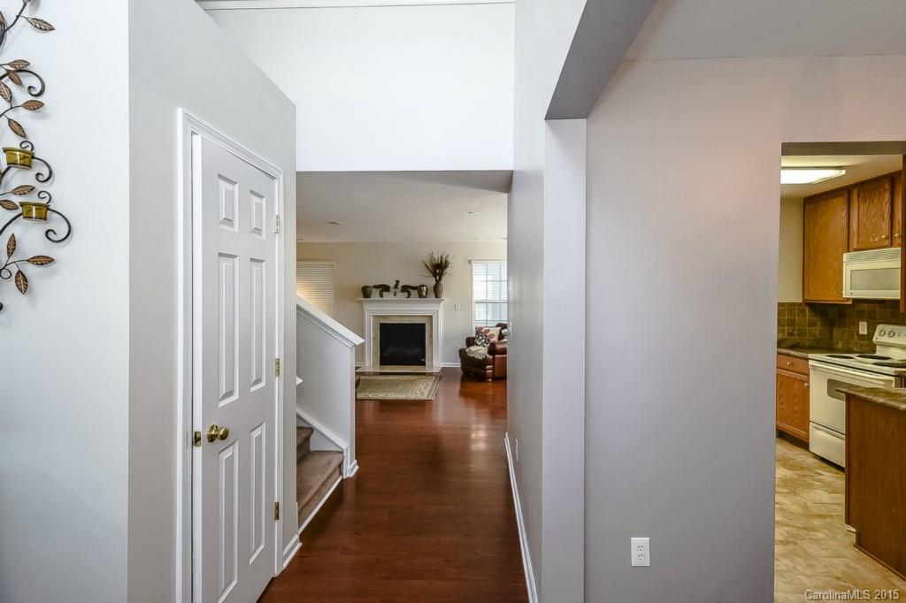 7475 Fallen Timber Lane Tega Cay, SC 29708 - Photo 4 of 24 a view of a kitchen from the hallway