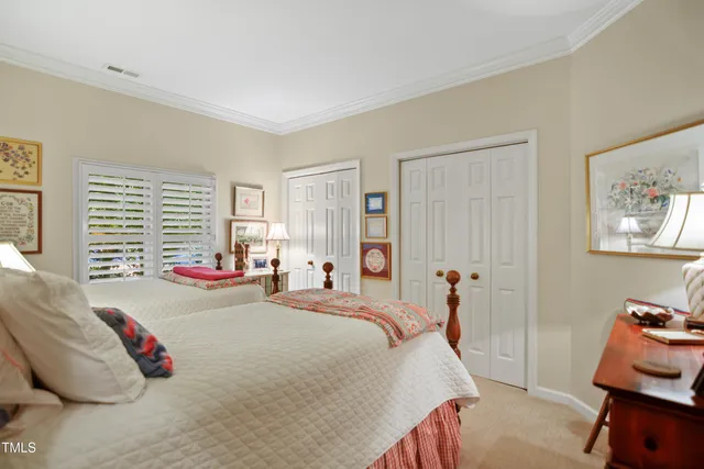 a bed room with a bed and a couch