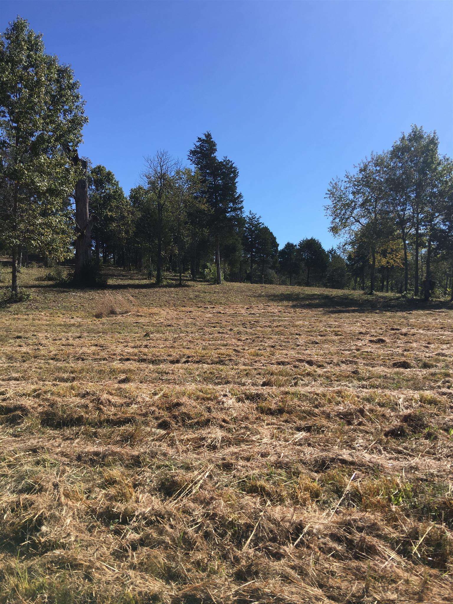 0 Knob Creek Road Santa Fe, TN 38482 - Photo 1 of 2 Beautiful cleared 5 acre lot with a very gentle slope to the back of the property on the corner of Haywood Hollow and Knob Creek